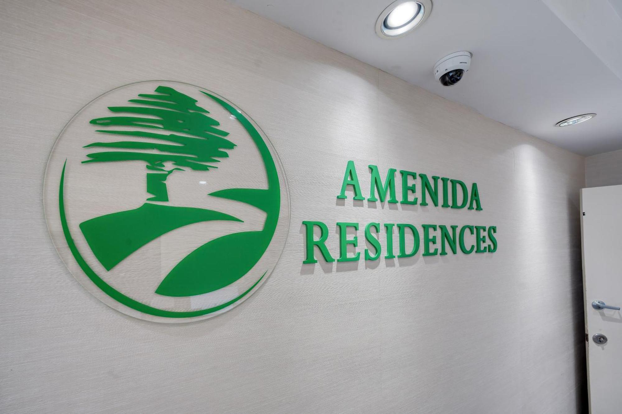 Amenida Residences, YYC Esterno foto