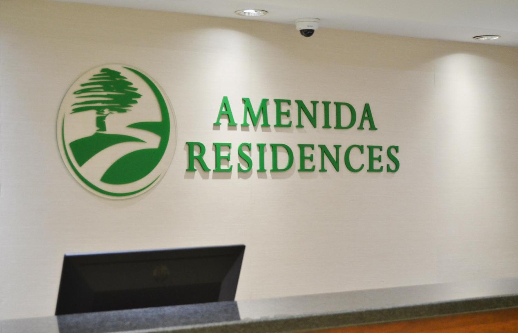 Amenida Residences, YYC Esterno foto
